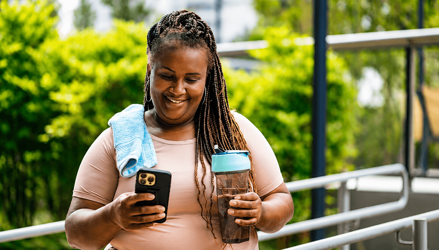 Woman reviewing her health plan on a phone